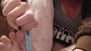 Measures toe and makes fun of what girl man you are